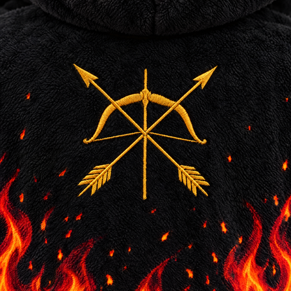 Close-up of the embroidered bow and arrows patch